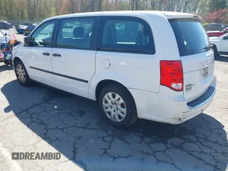 2016 Dodge Grand Caravan SE with VIN 2C4RDGBG9GR401187, listed as a IAAI auction lot 42133432 with 107,742 mi miles and . Bid and sale history available at DreamBid. Image 3.