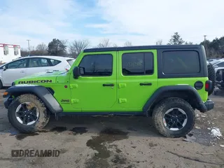 2021 Jeep Wrangler Unlimited Rubicon with VIN 1C4JJXFM1MW797737, listed as a IAAI auction lot 41371288 with 48,129 mi miles. Bid and sale history available at carsss.com. Image 14.