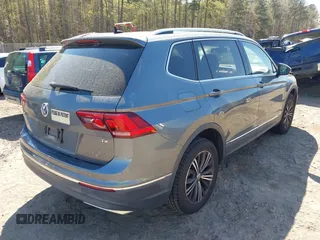 2018 Volkswagen Tiguan SEL with VIN 3VV3B7AX5JM036164, listed as a IAAI auction lot 41876403 with 108,269 mi miles and . Bid and sale history available at DreamBid. Image 4.