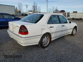 2000 Mercedes-Benz C 230 Kompressor with VIN WDBHA24G7YA822415, listed as a Copart auction lot 44250475 with 180,311 mi miles and Salvage Title. Bid and sale history available at carsss.com. Image 3.