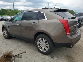 2014 Cadillac SRX Luxury Collection z VIN 3GYFNBE3XES626319, wystawiony jako Copart lot #54776405 z przebiegiem 107 734 mil mil oraz Szkody całkowita. Historia ofert i sprzedaży dostępna na DreamBid. Obrazek 2.