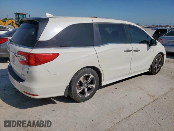 2018 Honda Odyssey Touring с VIN 5FNRL6H8XJB042111, выставлен на аукционе Copart как лот 52360005 с пробегом 126 835 миль миль и Чистый • Clean title. История ставок и продаж доступна на DreamBid. Изображение 3.