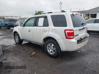 2009 Ford Escape Limited with VIN 1FMCU94G09KB77240, listed as a IAAI auction lot 42321802 with 143,127 mi miles and . Bid and sale history available at DreamBid. Image 3.