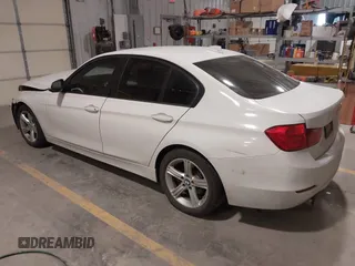 2014 BMW 3 Series 320i with VIN WBA3B1G57ENS79355, listed as a IAAI auction lot 41620998 with 97,362 mi miles. Bid and sale history available at carsss.com. Image 3.