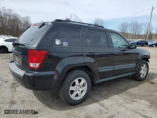 2009 Jeep Grand Cherokee Laredo with VIN 1J8GR48K79C537213, listed as a Copart auction lot 51222395 with 148,838 mi miles and Salvage Title. Bid and sale history available at carsss.com. Image 3.