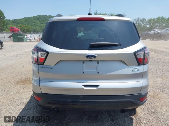 2017 Ford Escape SE z VIN 1FMCU9G95HUD37371, wystawiony jako IAAI lot #42393304 z przebiegiem 76 039 mil mil oraz . Historia ofert i sprzedaży dostępna na DreamBid. Obrazek 17.