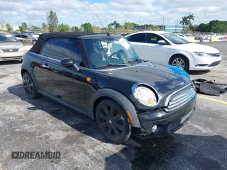 2010 MINI Convertible with VIN WMWMR3C54ATU96904, listed as a IAAI auction lot 39151247 with 109,019 mi miles and . Bid and sale history available at DreamBid. Image 1.