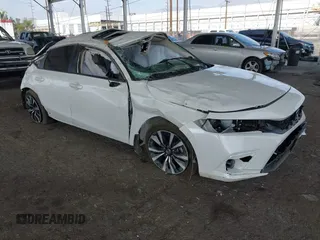 2024 Honda Civic EX-L z VIN 19XFL1H70RE030967, wystawiony jako IAAI lot #40998391 z przebiegiem Nie podano mil oraz . Historia ofert i sprzedaży dostępna na DreamBid. Obrazek 1.
