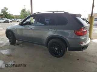 2012 BMW X5 35i with VIN 5UXZV4C56CL889802, listed as a Copart auction lot 62302265 with Not provided miles and Clean title. Bid and sale history available at DreamBid. Image 2.
