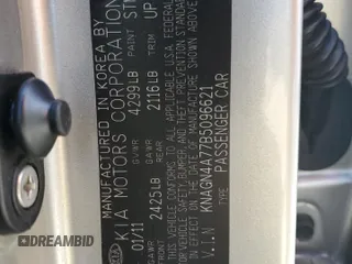 2011 Kia Optima EX z VIN KNAGN4A77B5096621, wystawiony jako Copart lot #53087945 z przebiegiem 189 899 mil mil oraz Szkoda całkowita • Salvage title. Historia ofert i sprzedaży dostępna na DreamBid. Obrazek 12.