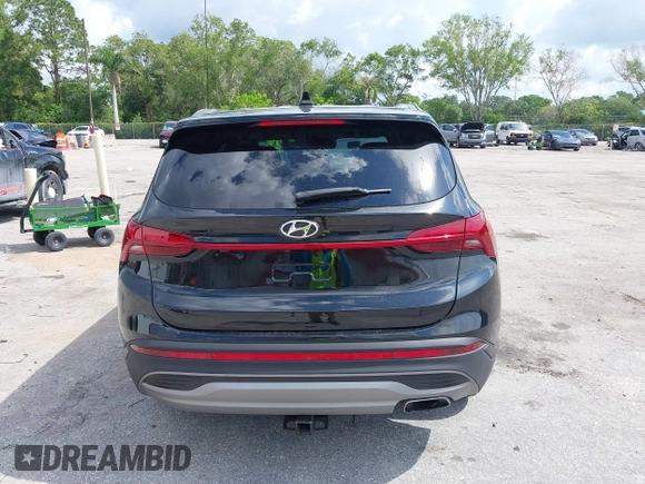 2021 Hyundai Santa Fe SE z VIN 5NMS14AJ0MH332918, wystawiony jako IAAI lot #42365534 z przebiegiem 58 720 mil mil oraz . Historia ofert i sprzedaży dostępna na DreamBid. Obrazek 16.