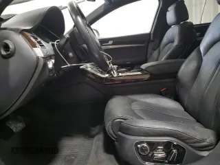 2015 Audi A8 z VIN WAUJGAFDXFN008499, wystawiony jako Copart lot #87658385 z przebiegiem 103 175 mil mil oraz Szkoda całkowita • Salvage title. Historia ofert i sprzedaży dostępna na DreamBid. Obrazek 7.