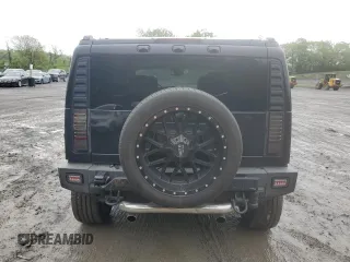 2006 Hummer H2 z VIN 5GRGN23U66H117438, wystawiony jako Copart lot #55833845 z przebiegiem 182 015 mil mil oraz Szkody całkowita. Historia ofert i sprzedaży dostępna na DreamBid. Obrazek 6.