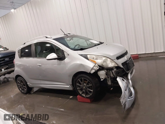 2013 Chevrolet Spark LT with VIN KL8CF6S99DC514212, listed as a IAAI auction lot 42052664 with 130,320 mi miles and . Bid and sale history available at DreamBid. Image 13.