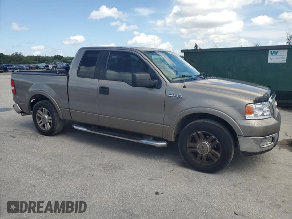 2005 Ford F-150 XLT with VIN 1FTRX12585FA42177, listed as a Copart auction lot 64841645 with 153,779 mi miles and Salvage title. Bid and sale history available at DreamBid. Image 4.