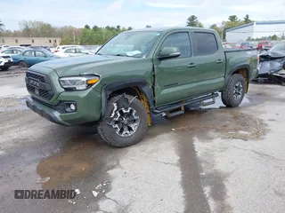 2021 Toyota Tacoma SR with VIN 3TMCZ5AN5MM380286, listed as a IAAI auction lot 42165523 with 58,965 mi miles and . Bid and sale history available at DreamBid. Image 17.