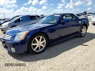 2004 Cadillac XLR z VIN 1G6YV34A045601459, wystawiony jako Copart lot #74522994 z przebiegiem Nie podano mil oraz Szkody całkowita. Historia ofert i sprzedaży dostępna na DreamBid. Obrazek 1.