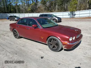2004 Jaguar XJ with VIN SAJWA73B24TG17566, listed as a Copart auction lot 42501425 with 130,666 mi miles and Clean Title. Bid and sale history available at carsss.com. Image 4.