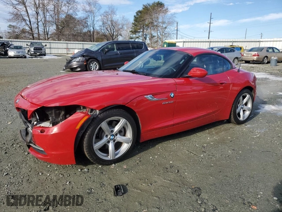 2014 BMW Z4 sDrive28i with VIN WBALL5C57EP556519, listed as a Copart auction lot 88090055 with 124,767 mi miles and Salvage Title. Bid and sale history available at carsss.com. Image 1.