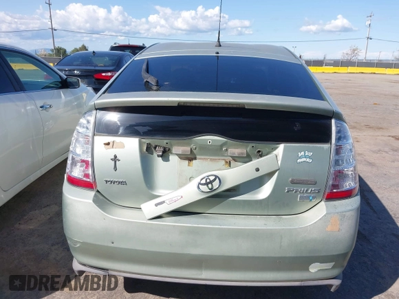 2007 Toyota Prius z VIN JTDKB20U877556527, wystawiony jako IAAI lot #41965245 z przebiegiem 259 572 mil mil oraz . Historia ofert i sprzedaży dostępna na DreamBid. Obrazek 16.