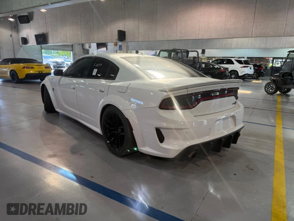 2021 Dodge Charger SRT Hellcat Widebody z VIN 2C3CDXL93MH662407, wystawiony jako Copart lot #58264615 z przebiegiem 56 012 mil mil oraz Czysty tytuł • Clean title. Historia ofert i sprzedaży dostępna na DreamBid. Obrazek 3.