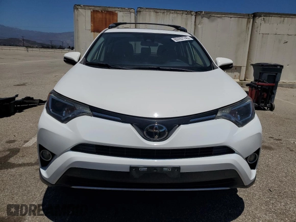 2018 Toyota RAV4 XLE with VIN JTMWFREV1JD122524, listed as a Copart auction lot 63707745 with 51,003 mi miles and Salvage title. Bid and sale history available at DreamBid. Image 5.