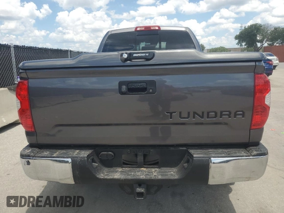 2019 Toyota Tundra SR with VIN 5TFRM5F13KX141745, listed as a Copart auction lot 56910955 with 67,856 mi miles and Salvage title. Bid and sale history available at DreamBid. Image 6.