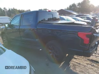 2023 Ford F-150 Lightning Pro with VIN 1FT6W1EV7PWG33511, listed as a IAAI auction lot 41761149 with 10,501 mi miles and . Bid and sale history available at DreamBid. Image 14.