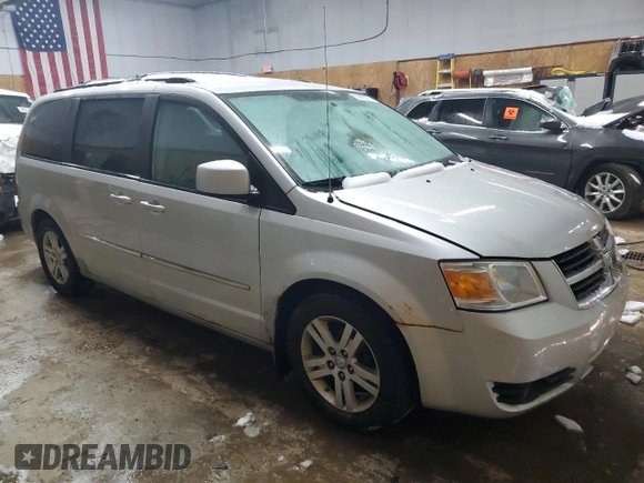 2010 Dodge Grand Caravan Crew with VIN 2D4RN6DX9AR390514, listed as a Copart auction lot 50906305 with 102,729 mi miles and Clean Title. Bid and sale history available at DreamBid. Image 4.