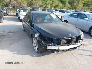 2013 BMW 7 Series 750i with VIN WBAYA8C59DC996552, listed as a IAAI auction lot 41921201 with 99,188 mi miles and . Bid and sale history available at DreamBid. Image 1.
