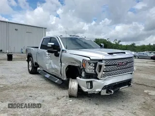 2020 GMC Sierra 2500HD Denali z VIN 1GT49REY7LF319360, wystawiony jako Copart lot #59770565 z przebiegiem 69 509 mil mil oraz Nie do naprawy • Non repairable. Historia ofert i sprzedaży dostępna na DreamBid. Obrazek 13.