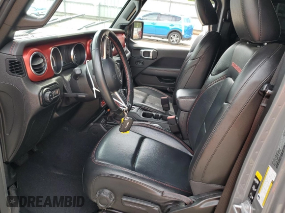 2021 Jeep Gladiator Rubicon с VIN 1C6JJTBG5ML507579, выставлен на аукционе Copart как лот 60409785 с пробегом 62 585 миль миль и Списание • Salvage title. История ставок и продаж доступна на DreamBid. Изображение 7.