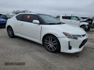 2016 Scion tC with VIN JTKJF5C73GJ019812, listed as a Copart auction lot 84228844 with 153,692 mi miles and Salvage Title. Bid and sale history available at carsss.com. Image 4.
