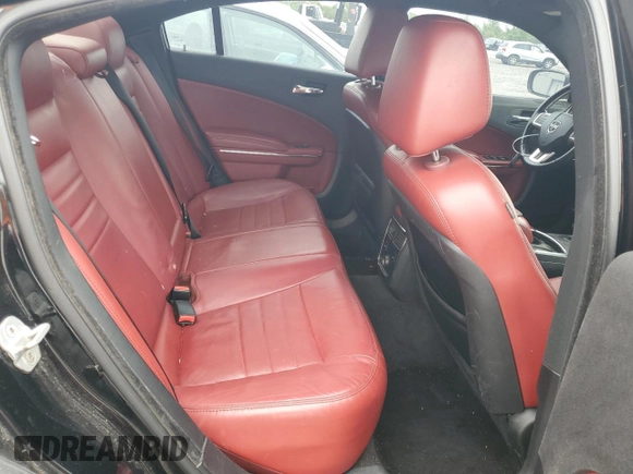 2013 Dodge Charger SXT z VIN 2C3CDXHG6DH525694, wystawiony jako Copart lot #54911495 z przebiegiem 189 992 mil mil oraz Szkoda całkowita • Salvage title. Historia ofert i sprzedaży dostępna na DreamBid. Obrazek 10.