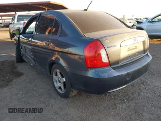 2011 Hyundai Accent GLS with VIN KMHCN4AC7BU610676, listed as a IAAI auction lot 42051520 with 165,902 mi miles. Bid and sale history available at carsss.com. Image 3.
