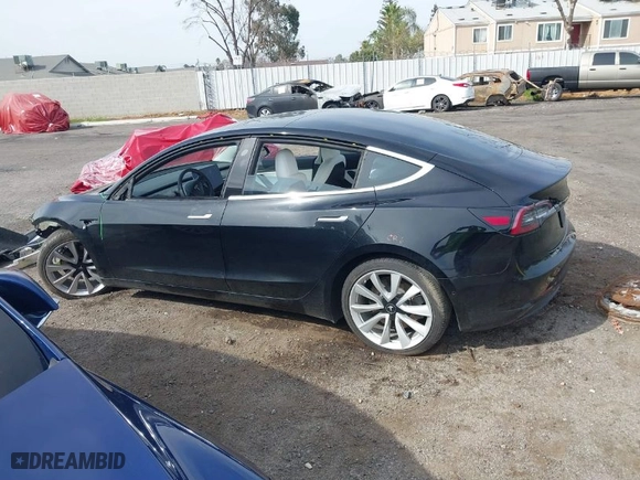 2019 Tesla Model 3 Long Range with VIN 5YJ3E1EB5KF391424, listed as a IAAI auction lot 41670930 with NaN miles. Bid and sale history available at carsss.com. Image 15.