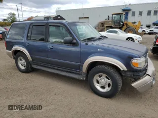 2000 Ford Explorer Eddie Bauer with VIN 1FMZU74E4YZA75510, listed as a Copart auction lot 75601964 with 196,180 mi miles and Salvage title. Bid and sale history available at DreamBid. Image 4.