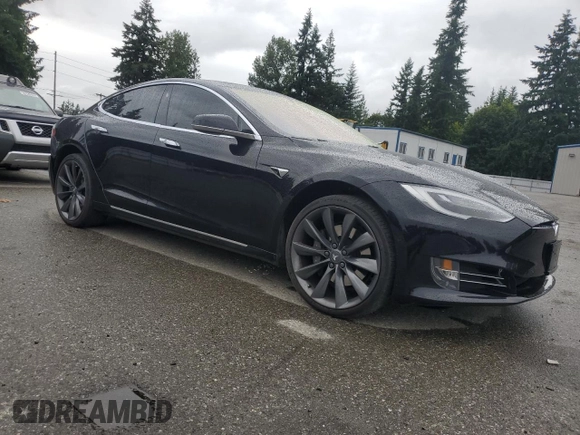 2017 Tesla Model S 100D с VIN 5YJSA1E21HF188840, выставлен на аукционе Copart как лот 62683685 с пробегом 90 101 миль миль и Списание • Salvage title. История ставок и продаж доступна на DreamBid. Изображение 4.