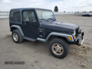2000 Jeep Wrangler Sport z VIN 1J4FA49S9YP798353, wystawiony jako Copart lot #62009645 z przebiegiem 116 676 mil mil oraz Szkoda całkowita • Salvage title. Historia ofert i sprzedaży dostępna na DreamBid. Obrazek 4.