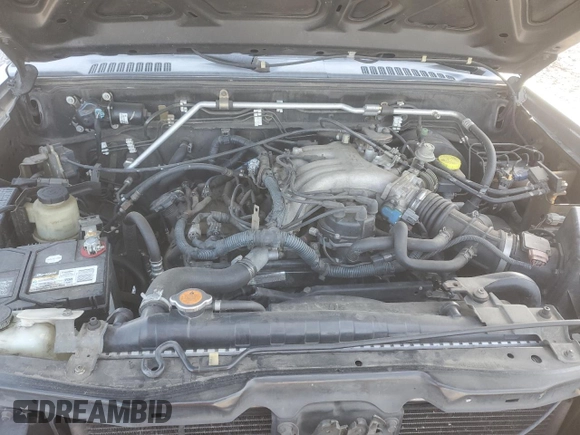 2004 Nissan Frontier XE z VIN 1N6ED27T24C482171, wystawiony jako Copart lot #42026145 z przebiegiem 221 942 mil mil oraz Szkoda całkowita • Salvage title. Historia ofert i sprzedaży dostępna na DreamBid. Obrazek 13.