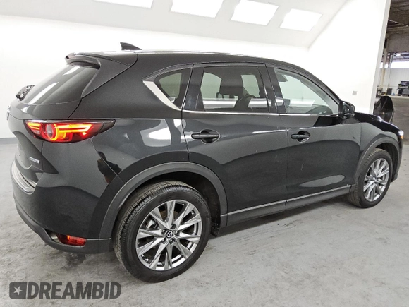 2021 Mazda CX-5 Grand Touring with VIN JM3KFBDM6M0487606, listed as a Copart auction lot 45399655 with 25,241 mi miles and Clean Title. Bid and sale history available at DreamBid. Image 3.