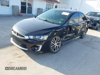 2017 Mitsubishi Lancer ES with VIN JA32V2FWXHU000916, listed as a IAAI auction lot 41727166 with 85,182 mi miles. Bid and sale history available at carsss.com. Image 2.