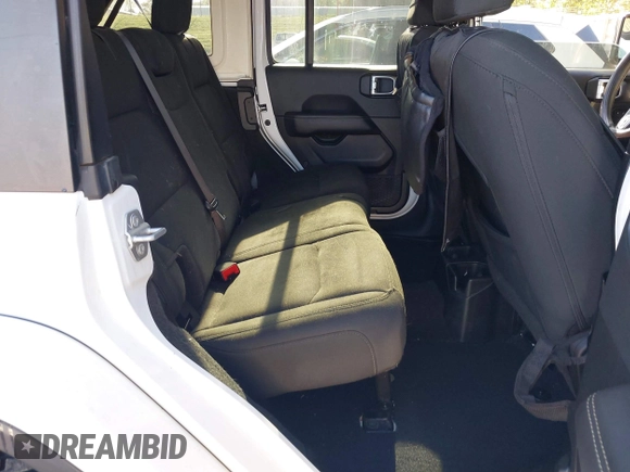 2019 Jeep Wrangler Unlimited Sahara with VIN 1C4HJXEN2KW591557, listed as a IAAI auction lot 41962034 with 88,691 mi miles and . Bid and sale history available at DreamBid. Image 8.