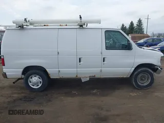 2013 Ford Econoline Cargo Commercial with VIN 1FTNE2EW9DDA82065, listed as a IAAI auction lot 42073299 with 259,758 mi miles and . Bid and sale history available at DreamBid. Image 13.