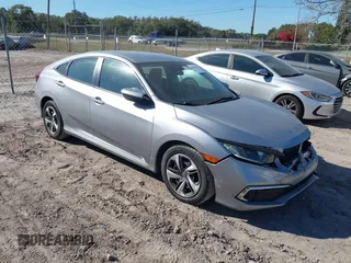 2020 Honda Civic LX with VIN 19XFC2F62LE009433, listed as a IAAI auction lot 40963670 with 117,865 mi miles and . Bid and sale history available at DreamBid. Image 1.