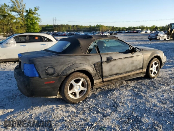 2004 Ford Mustang Deluxe z VIN 1FAFP44654F143868, wystawiony jako Copart lot #52991535 z przebiegiem 167 015 mil mil oraz Czysty tytuł • Clean title. Historia ofert i sprzedaży dostępna na DreamBid. Obrazek 3.