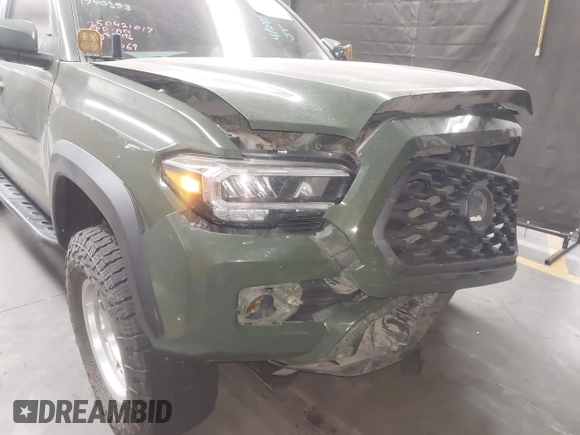 2021 Toyota Tacoma SR z VIN 3TYCZ5AN2MT049069, wystawiony jako IAAI lot #42116964 z przebiegiem 96 275 mil mil oraz . Historia ofert i sprzedaży dostępna na DreamBid. Obrazek 6.