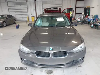 2015 BMW 3 Series 328i with VIN WBA3A5C57FF609734, listed as a IAAI auction lot 41392336 with 121,378 mi miles. Bid and sale history available at carsss.com. Image 12.