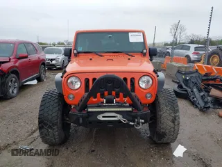 2015 Jeep Wrangler Unlimited Sahara with VIN 1C4BJWEG6FL603265, listed as a IAAI auction lot 41956606 with 70,983 mi miles. Bid and sale history available at carsss.com. Image 12.