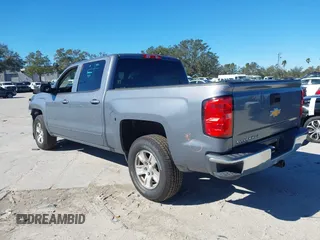 2016 Chevrolet Silverado 1500 LT with VIN 3GCUKREC8GG219524, listed as a IAAI auction lot 41087657 with 123,010 mi miles and . Bid and sale history available at DreamBid. Image 3.